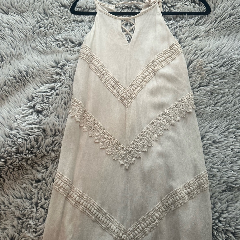 Elegant Cream Halter Dress with Lace Details